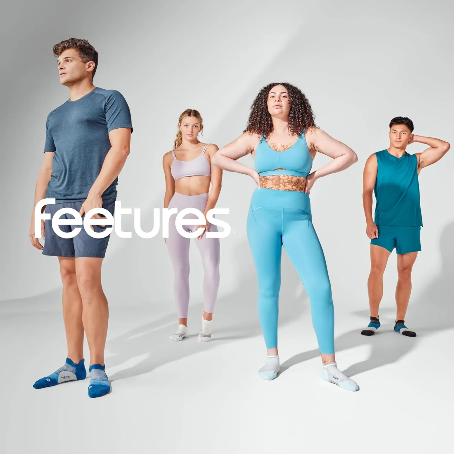 Feetures Elite Light Cushion Mini Crew Sock - Sport Sock with Targeted Compression - (1 Pair)